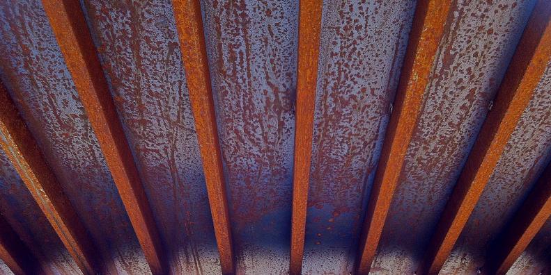 Rusted Exposed Beams on Metal Entry Roof