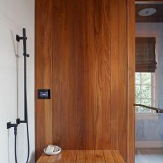 Wood Paneled Wall and Shower Bench