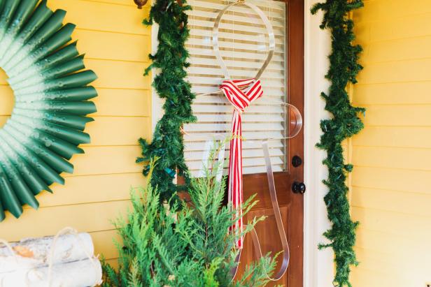 Traditional holiday door decor gets a playful upgrade with this clever DIY Aluminum Gingerbread Man.