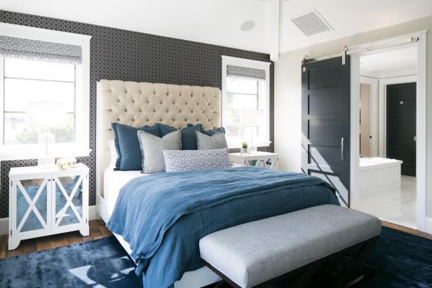 Transitional Bedroom With Upholstered Headboard and Blue Bedding