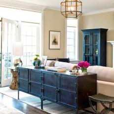 Neutral Living Room Condo With Antique Sideboard