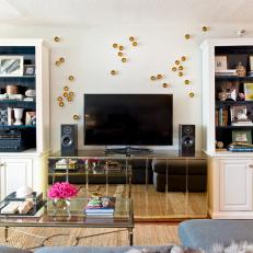 Transitional Media Room With Mirrored Credenza in Condo