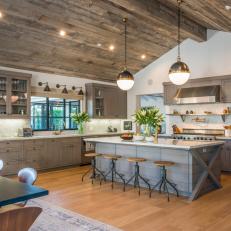 Gorgeous Transitional Wood Kitchen With Island Bar Seating, Built-In Gray Cabinetry and Connected Dining Room 