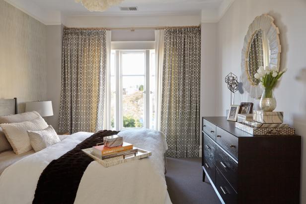 Bright Classy Bedroom With Plush White And Neutral Bed Covers