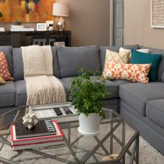 Living Room With Gray Sectional & Geometric Coffee Table