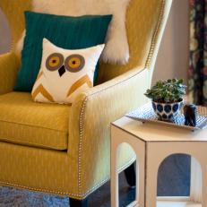 Yellow Wingback Chair With Flokati Throw Blanket