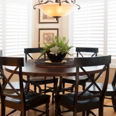Traditional Dining Room With Circular Wood Coffee Table