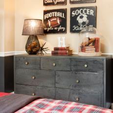 Kid's Bedroom With Retro Sports Art and Industrial Chest