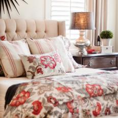 Traditional Neutral Bedroom With Red Floral Bed Linens