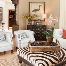 Living Room With Zebra Ottoman, Contemporary Armchairs and Bird Painting