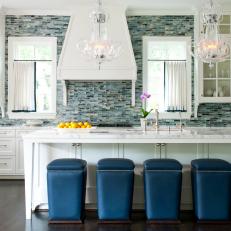 Traditional Kitchen With Pearl-Finish Backsplash and Contemporary Barstools