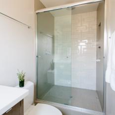 Shower Stall With Modern White Tile Pattern