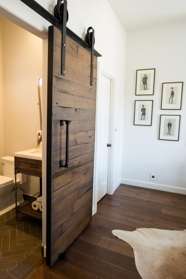 Reclaimed Wood Barn Door Gets Things Rolling In Bathroom | HGTV