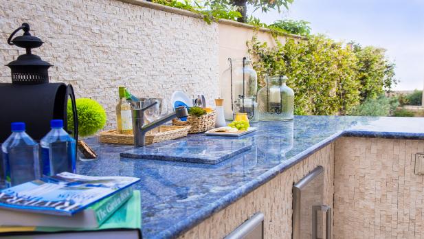 Rough Tile Outdoor Kitchen With Smooth Blue Marble Countertop And