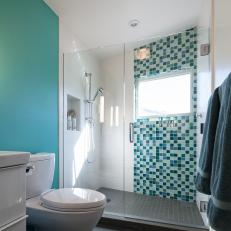 Contemporary Bathroom With Turquoise Accent Wall, Glass Shower Door and Turquoise and Green Glass Tile Shower Decoration 