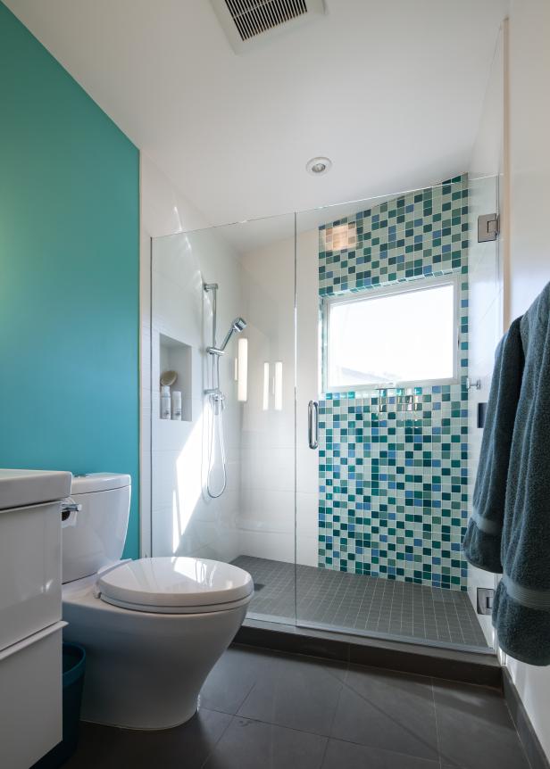 Contemporary Bathroom With Turquoise Accent Wall, Glass Shower Door and Turquoise and Green