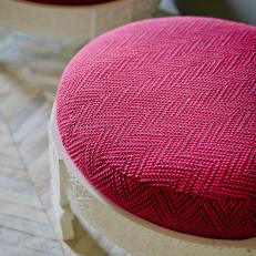 Pink Patterned Ottomans in Master Retreat