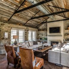 Great Room With Vaulted Wood Ceiling and Exposed Ductwork