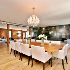 Loft With Large Dining Table, Hardwood Floor and Crystal Chandelier