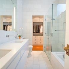 Modern White Bathroom With Double Vanity & Glass Shower