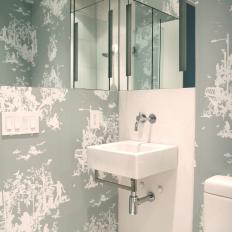 Modern Powder Room With Patterned Wallpaper, Mirrors and Floating Sink
