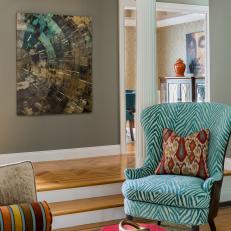 Living Room Entry With Dimensional Art and Bold Color