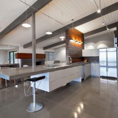 Modern Kitchen with Floating Kitchen Island and High, Exposed-beam Ceilings