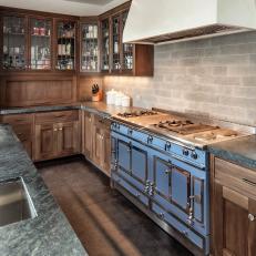Kitchen With Craftsman-Inspired Cabinets and Blue Stove