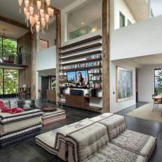 Great Room With High Ceilings and Concrete Floors