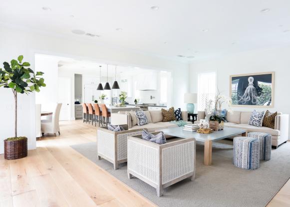 White Living Room With Neutral Furniture and Blue Accents