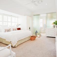 Bright & Airy Master Bedroom With White Linens & Furnishings