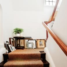 White Staircase Features Framed Photos