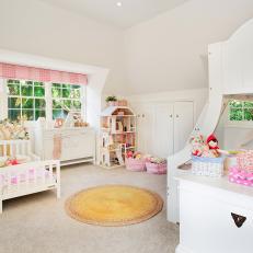 Spacious Girl's Room With Pink Accessories, Bunk Beds & Doll House