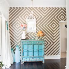 Hallway Features Geometric Wallpaper & Turquoise Cabinet