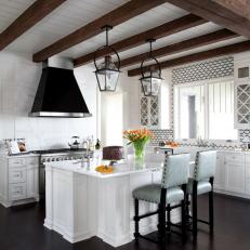 Stunning and Chic White Kitchen With Calacatta Marble Countertops 