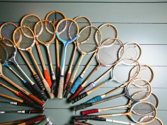 Badminton Rackets Mounted on Paneled Wall