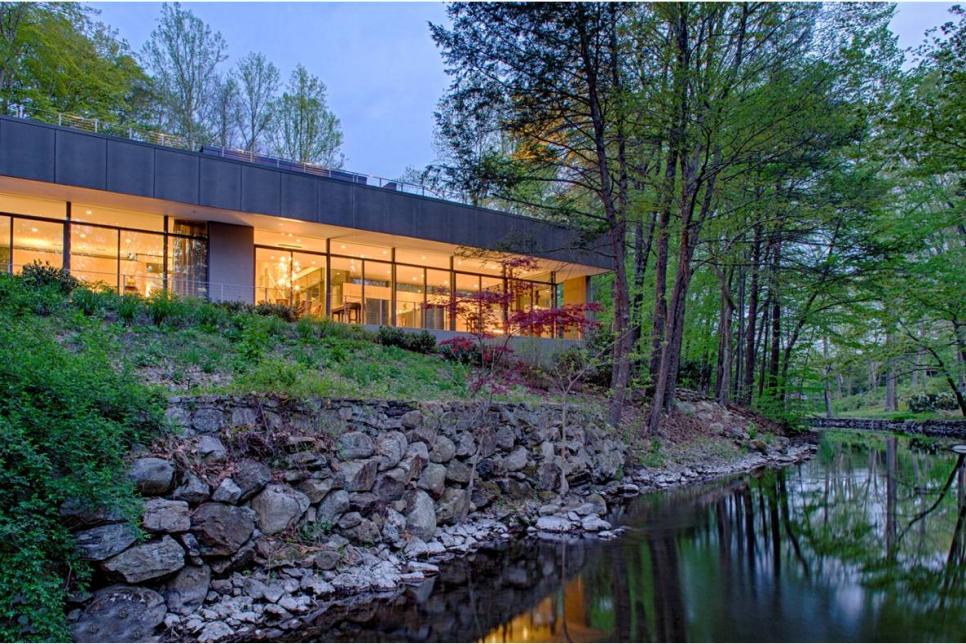 Modern Gray Home With Views of River