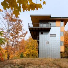 Contemporary Home Exterior Features Sleek Metal Walls
