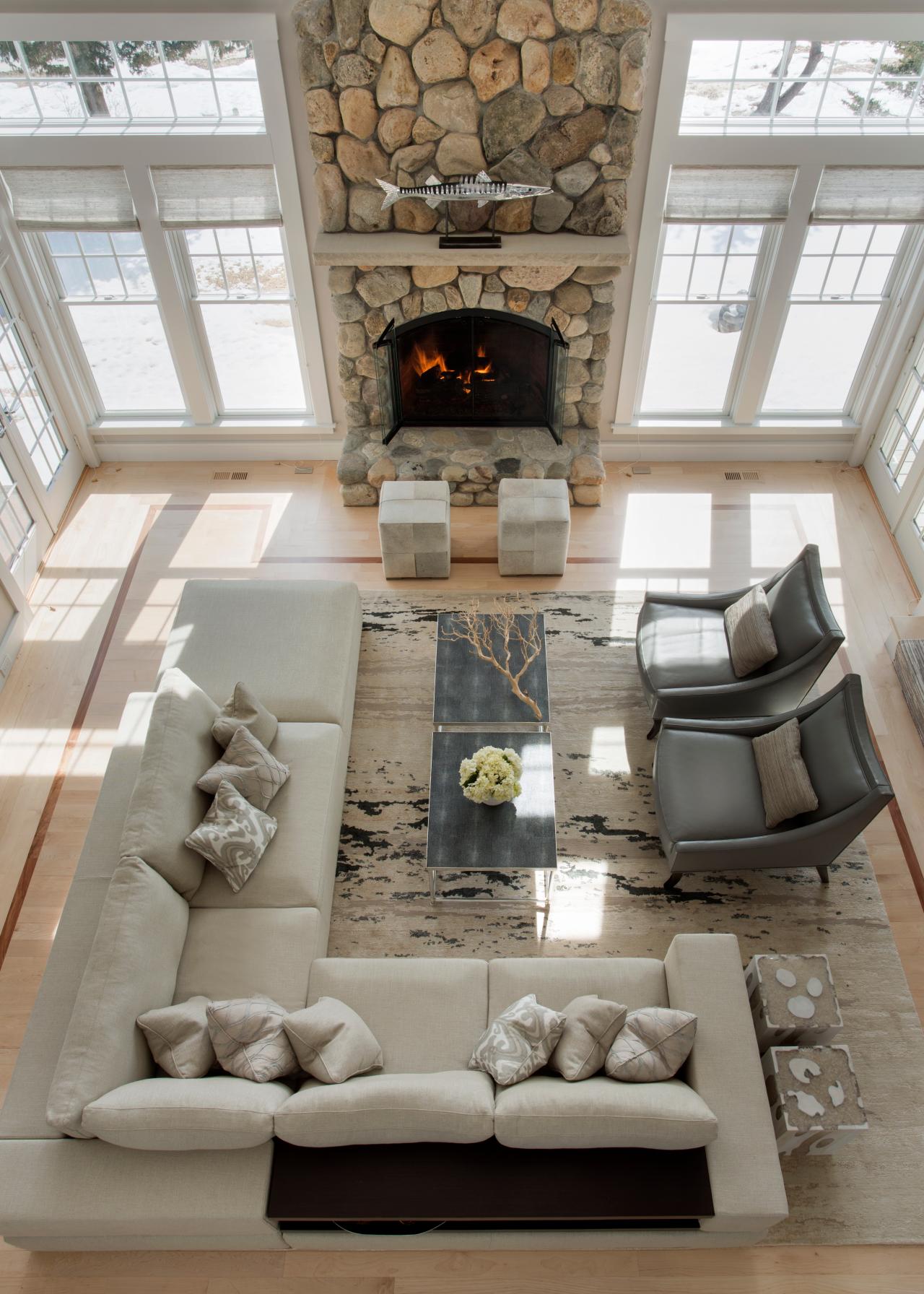 Coast Living Room with Dramatic Stone Fireplace HGTV