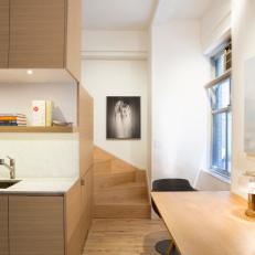 Lofted Sleeping Area Opens Up Studio for Larger Kitchen