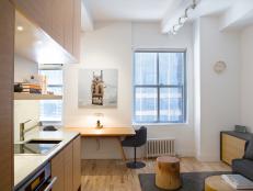 Studio Apartment Living Area Minimizes Clutter, Maximizes Space