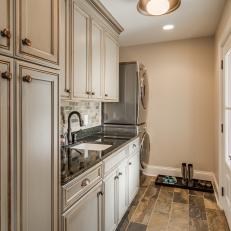 Laundry Room & Mudroom Combo Boasts Ample Cabinet Space