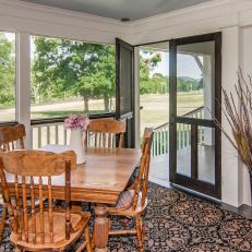 Country-Style Dining Set on Breezy Screened Porch