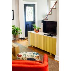 Cheery Foyer & Living Room With Yellow Media Console