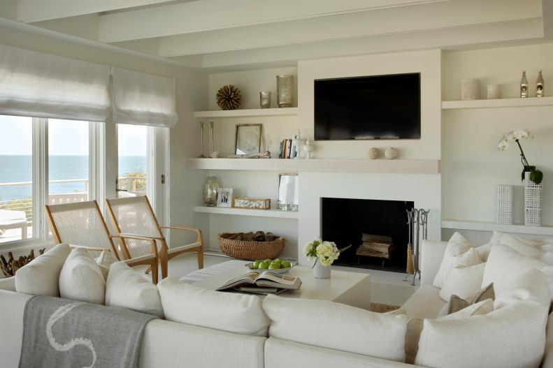 White, Coastal Living Room With Built-In Shelving