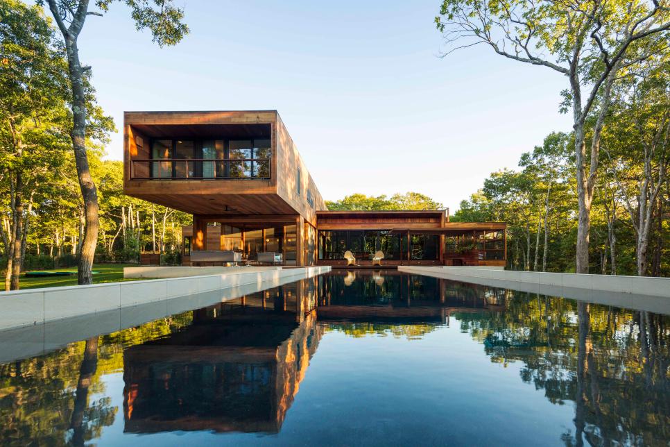 Modern Cantilevered Cabin Overlooking Long Swimming Pool
