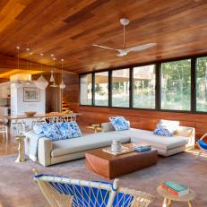 Neutral Modern Great Room With Wood Paneling