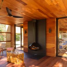 Modern Wood-Paneled Porch With Stove