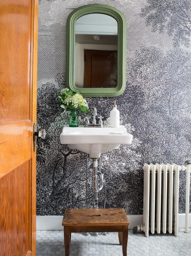 Small bathrooms can be a challenge to decorate, but they can also be a great place to be bold and daring with pattern, color and style.  Itâ  s a perfect room for some graphic wallpaper that will make a big statement in this little space.