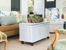 Old wooden trunks are stowed away in many attics and often end up in yard sales or thrift stores at a great price.  Give one of them an update by simply adding casters to make it a functional (and mobile) coffee table.